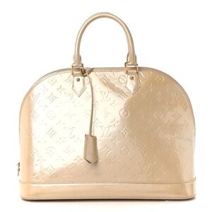 LOUIS VUITTON Vernis Alma GM in Florentin.